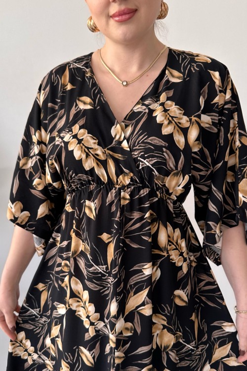 Robe noire fendue devant à motif feuilles