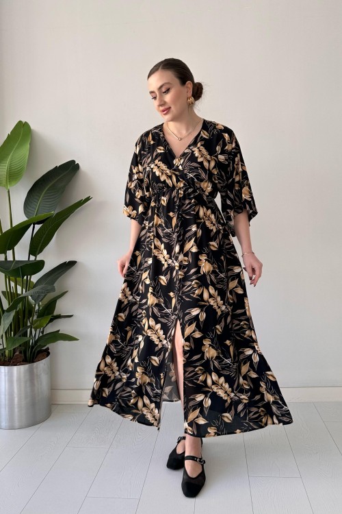 Robe noire fendue devant à motif feuilles